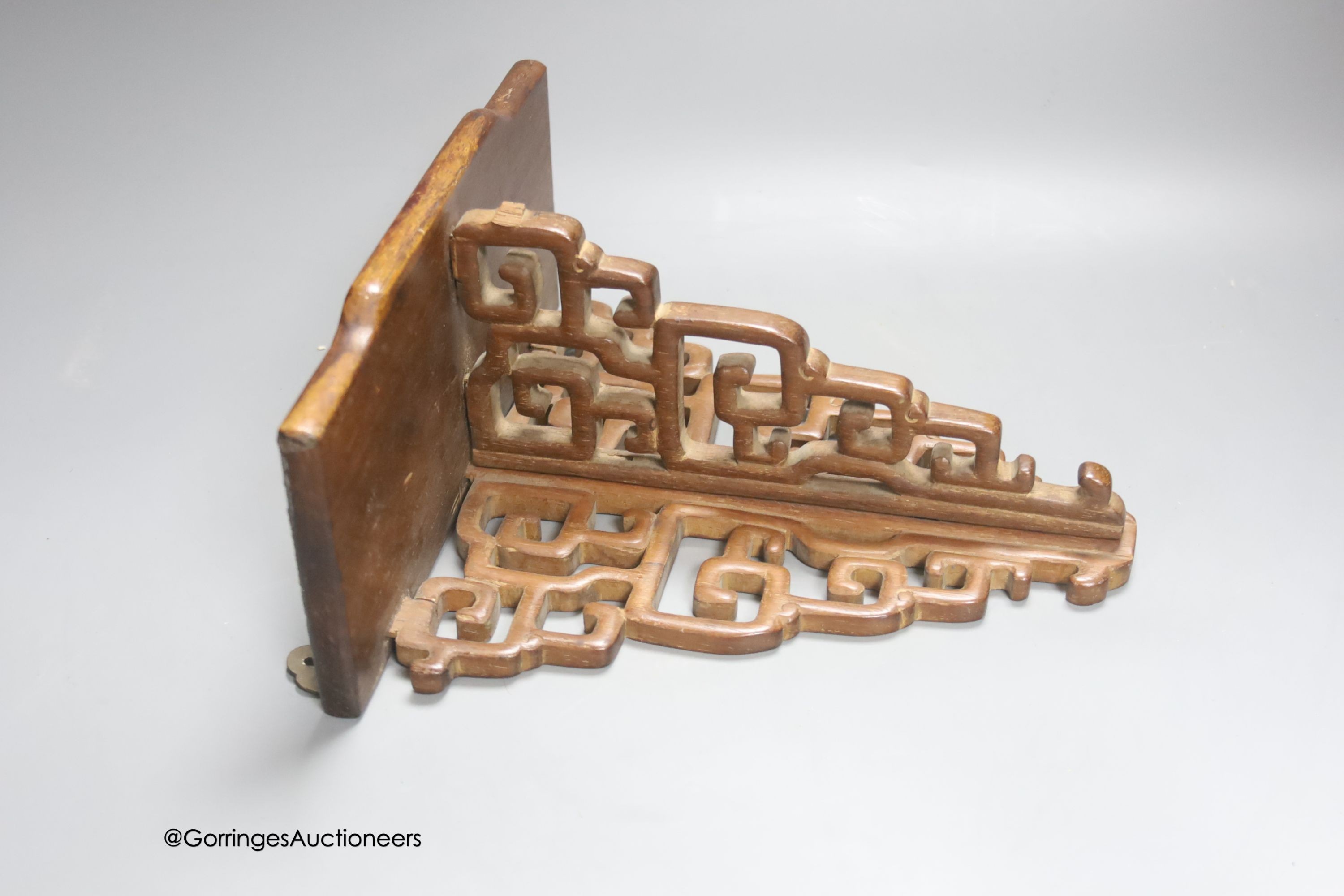 A Chinese hardwood wall bracket, late Qing, length 23cm